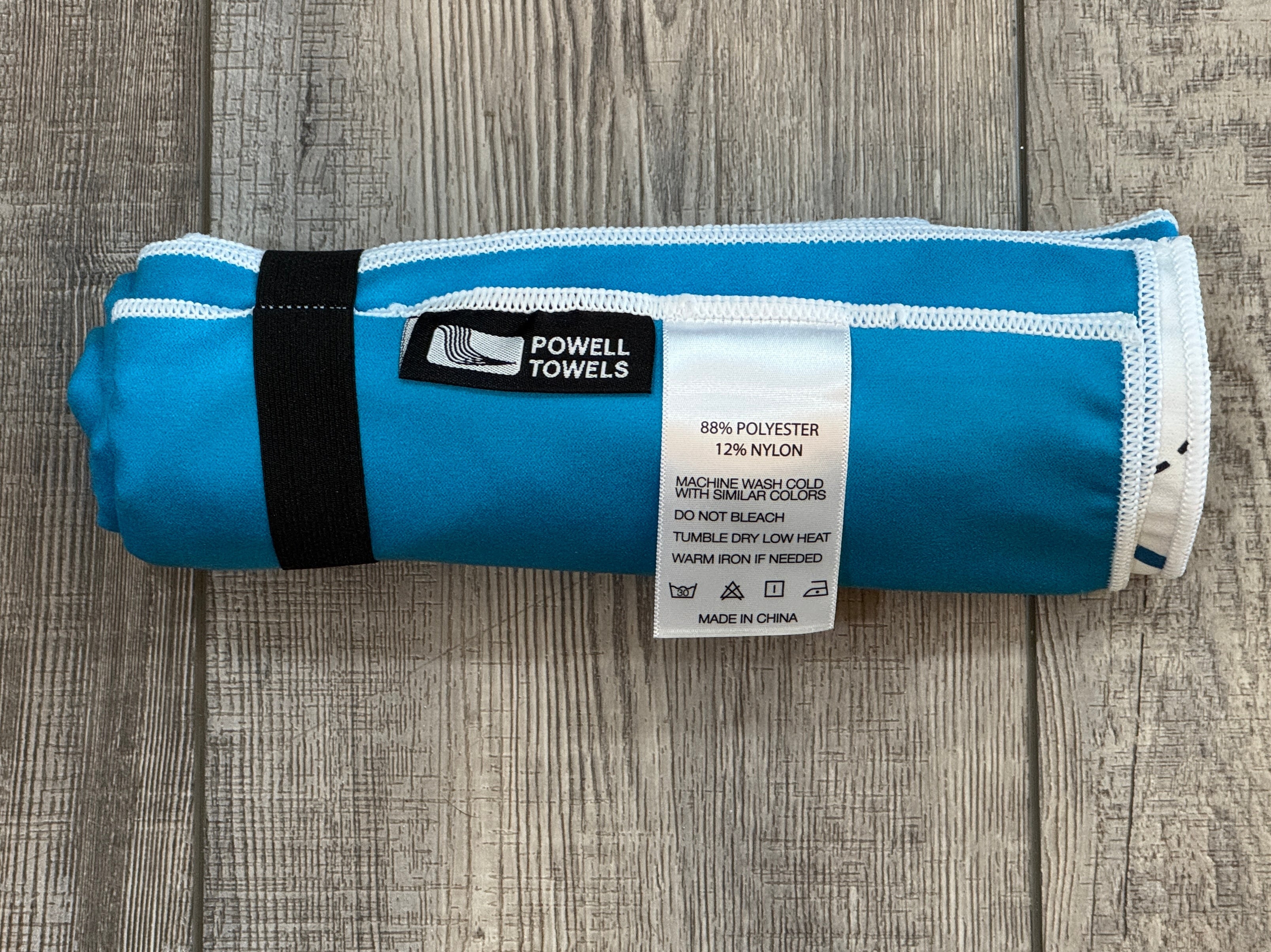 Lake Powell map beach towel rolled up with Anchor Loop - compact and packable for any adventure