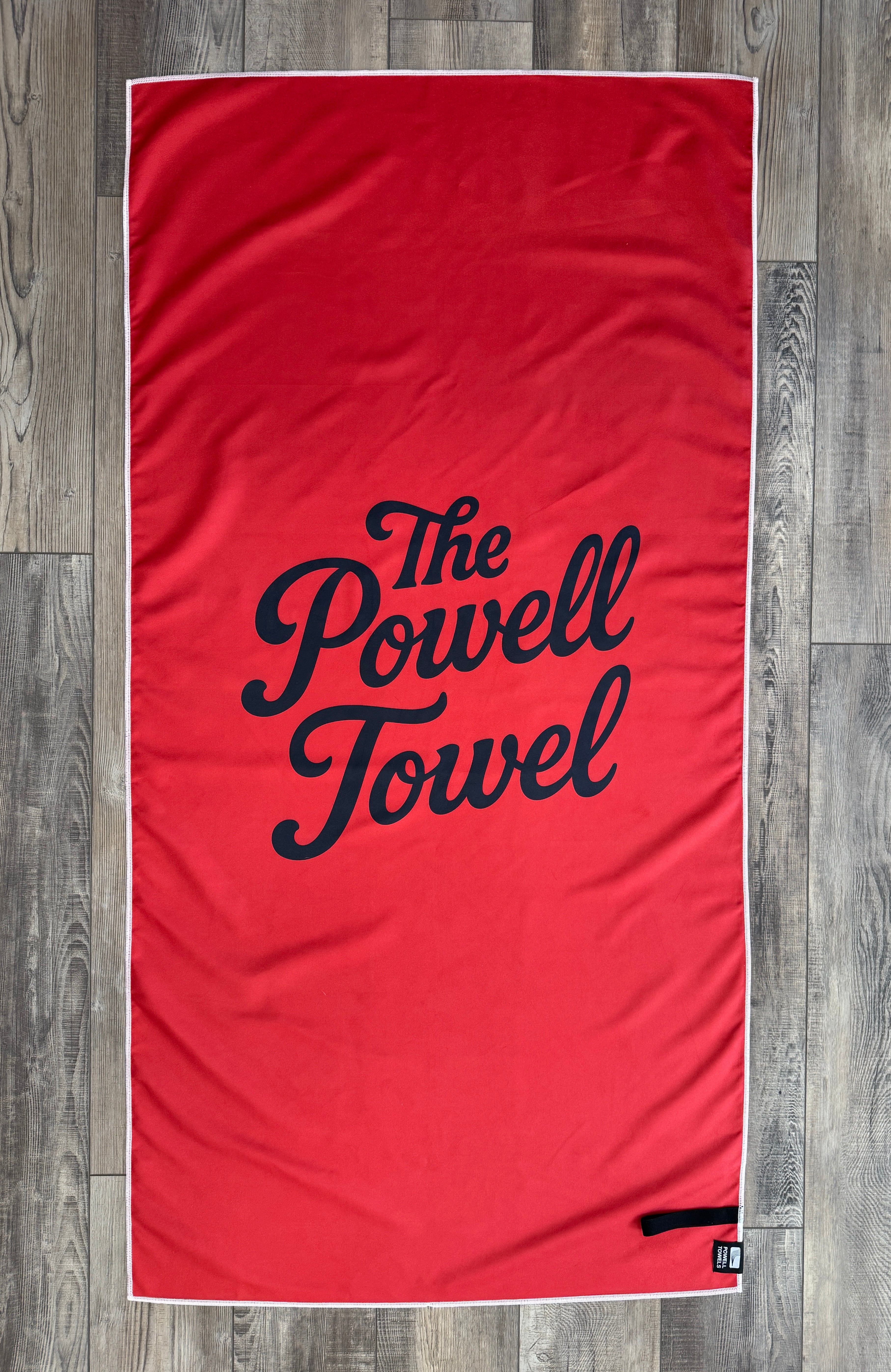 Lake Powell map beach towel red - back view showing full map coverage on wooden background